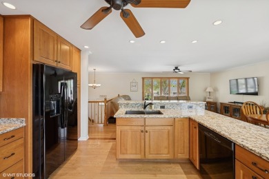 This beautifully updated home with its open floor plan, hardwood on Twin Lakes Golf Course in Illinois - for sale on GolfHomes.com, golf home, golf lot