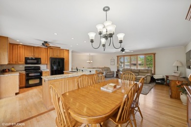 This beautifully updated home with its open floor plan, hardwood on Twin Lakes Golf Course in Illinois - for sale on GolfHomes.com, golf home, golf lot