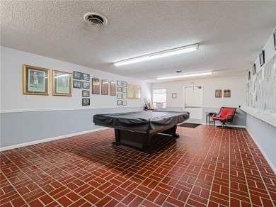 Completely redone with tile floors throughout, updated kitchen on Monterey Yacht and Country Club in Florida - for sale on GolfHomes.com, golf home, golf lot