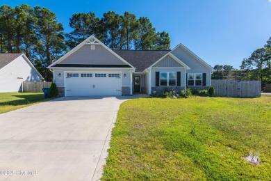 Welcome home to this beautifully maintained 3-bedroom, 2-bath on North Shore Country Club in North Carolina - for sale on GolfHomes.com, golf home, golf lot