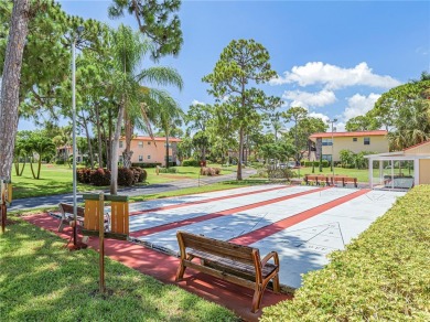 Completely redone with tile floors throughout, updated kitchen on Monterey Yacht and Country Club in Florida - for sale on GolfHomes.com, golf home, golf lot