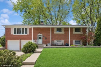 This beautifully updated home with its open floor plan, hardwood on Twin Lakes Golf Course in Illinois - for sale on GolfHomes.com, golf home, golf lot