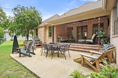 Located on a quiet cul-de-sac, this beautifully maintained on Reunion Golf Club in Mississippi - for sale on GolfHomes.com, golf home, golf lot