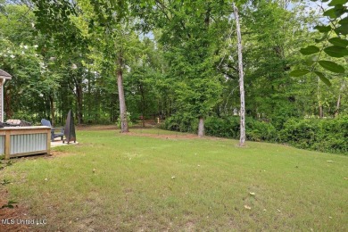 Located on a quiet cul-de-sac, this beautifully maintained on Reunion Golf Club in Mississippi - for sale on GolfHomes.com, golf home, golf lot