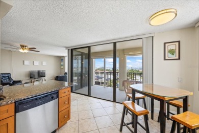 Welcome to your tropical retreat in the highly sought-after Isla on Isla Del Sol Yacht and Country Club in Florida - for sale on GolfHomes.com, golf home, golf lot