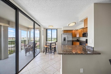 Welcome to your tropical retreat in the highly sought-after Isla on Isla Del Sol Yacht and Country Club in Florida - for sale on GolfHomes.com, golf home, golf lot
