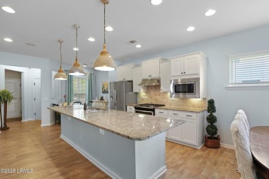 Don't miss this stunning former model home with golf & lagoon on Okatie Creek Golf Club in South Carolina - for sale on GolfHomes.com, golf home, golf lot