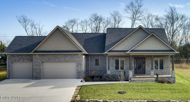 Stunning All-Brick Home with 3 car garage in Kahite subdivision on Tellico Village -The Links At Kahite Golf Course in Tennessee - for sale on GolfHomes.com, golf home, golf lot