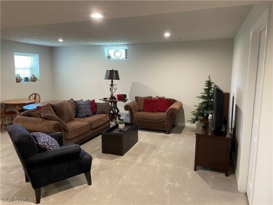 Experience elegance and comfort in this stunning stone-front on Club Walden in Ohio - for sale on GolfHomes.com, golf home, golf lot
