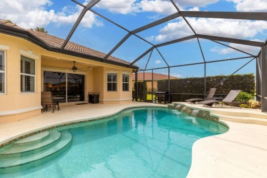Experience luxury in this stunning pool home with breathtaking on PGA Golf Club in PGA Village in Florida - for sale on GolfHomes.com, golf home, golf lot