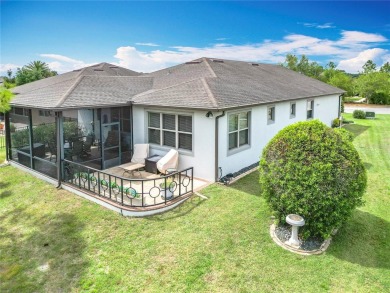 Experience the charm of this spacious and beautifully appointed on Stone Creek Golf Club in Florida - for sale on GolfHomes.com, golf home, golf lot