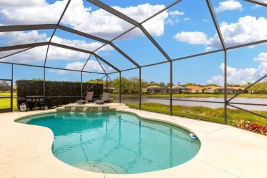 Experience luxury in this stunning pool home with breathtaking on PGA Golf Club in PGA Village in Florida - for sale on GolfHomes.com, golf home, golf lot