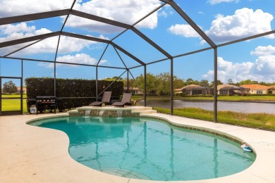 Experience luxury in this stunning pool home with breathtaking on PGA Golf Club in PGA Village in Florida - for sale on GolfHomes.com, golf home, golf lot