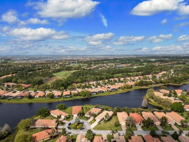 Experience luxury in this stunning pool home with breathtaking on PGA Golf Club in PGA Village in Florida - for sale on GolfHomes.com, golf home, golf lot