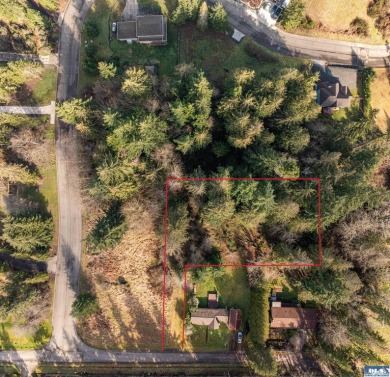 Approximately 3/4 acre in a neighborhood of upscale homes on Peninsula Golf Club Inc. in Washington - for sale on GolfHomes.com, golf home, golf lot