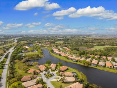Experience luxury in this stunning pool home with breathtaking on PGA Golf Club in PGA Village in Florida - for sale on GolfHomes.com, golf home, golf lot