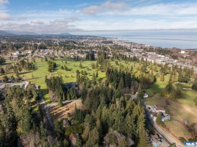 Approximately 3/4 acre in a neighborhood of upscale homes on Peninsula Golf Club Inc. in Washington - for sale on GolfHomes.com, golf home, golf lot