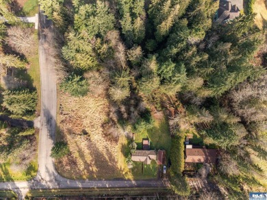 Approximately 3/4 acre in a neighborhood of upscale homes on Peninsula Golf Club Inc. in Washington - for sale on GolfHomes.com, golf home, golf lot
