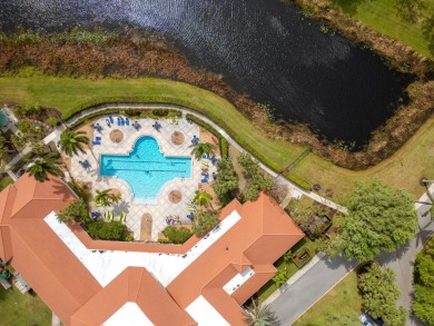 Experience luxury in this stunning pool home with breathtaking on PGA Golf Club in PGA Village in Florida - for sale on GolfHomes.com, golf home, golf lot