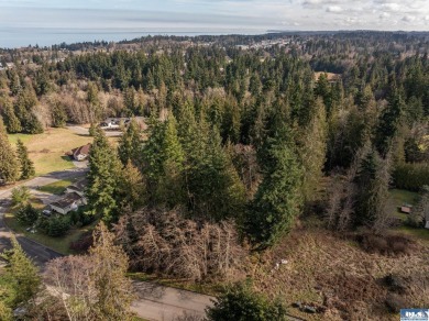 Approximately 3/4 acre in a neighborhood of upscale homes on Peninsula Golf Club Inc. in Washington - for sale on GolfHomes.com, golf home, golf lot