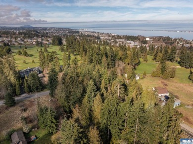 Approximately 3/4 acre in a neighborhood of upscale homes on Peninsula Golf Club Inc. in Washington - for sale on GolfHomes.com, golf home, golf lot