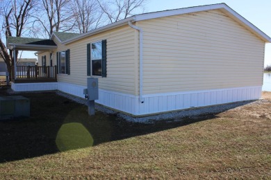 Recently installed and ready for its new owner! This is a 1997 on Mark Twain Country Club in Missouri - for sale on GolfHomes.com, golf home, golf lot