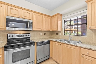 Welcome to this 2-bedroom, 1-bathroom, GROUND-FLOOR condo in on Pasadena Yacht and Country Club in Florida - for sale on GolfHomes.com, golf home, golf lot