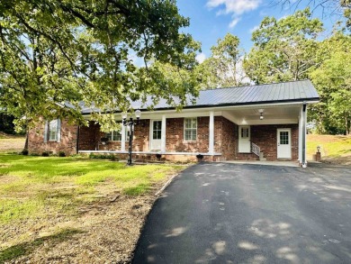 Experience luxury living in this completely remodeled 4-bedroom on Selmer Golf and Country Club in Tennessee - for sale on GolfHomes.com, golf home, golf lot