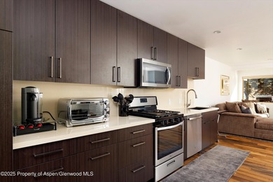 Remodeled Country Club Townhouse with Stunning Views and Premier on The Snowmass Club in Colorado - for sale on GolfHomes.com, golf home, golf lot