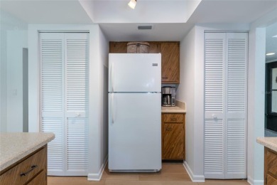 Escape to a peaceful, tree-lined oasis in this beautifully on Palm Harbor Golf Club in Florida - for sale on GolfHomes.com, golf home, golf lot
