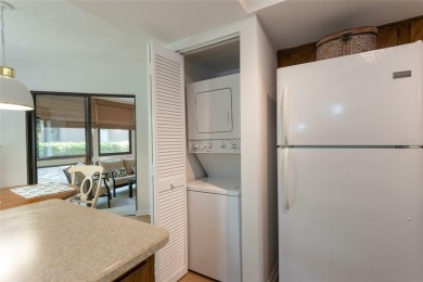 Escape to a peaceful, tree-lined oasis in this beautifully on Palm Harbor Golf Club in Florida - for sale on GolfHomes.com, golf home, golf lot