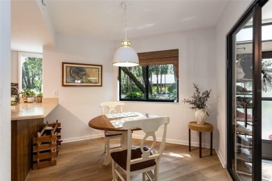 Escape to a peaceful, tree-lined oasis in this beautifully on Palm Harbor Golf Club in Florida - for sale on GolfHomes.com, golf home, golf lot