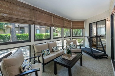 Escape to a peaceful, tree-lined oasis in this beautifully on Palm Harbor Golf Club in Florida - for sale on GolfHomes.com, golf home, golf lot