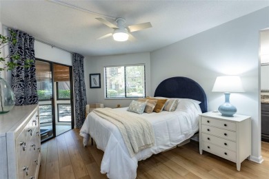 Escape to a peaceful, tree-lined oasis in this beautifully on Palm Harbor Golf Club in Florida - for sale on GolfHomes.com, golf home, golf lot