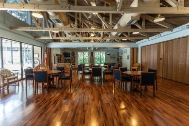 Escape to a peaceful, tree-lined oasis in this beautifully on Palm Harbor Golf Club in Florida - for sale on GolfHomes.com, golf home, golf lot
