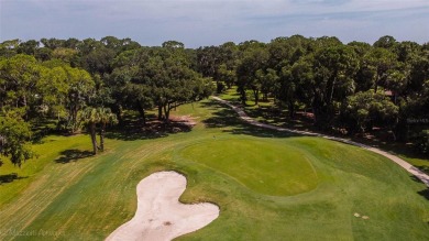 Escape to a peaceful, tree-lined oasis in this beautifully on Palm Harbor Golf Club in Florida - for sale on GolfHomes.com, golf home, golf lot