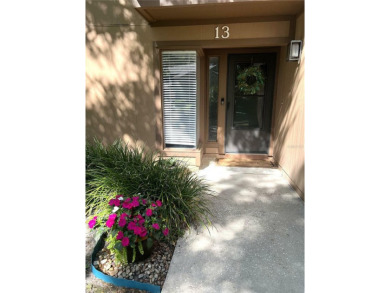 Escape to a peaceful, tree-lined oasis in this beautifully on Palm Harbor Golf Club in Florida - for sale on GolfHomes.com, golf home, golf lot