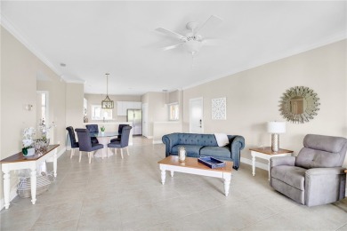 Fabulous Harmony Island and rarely available 3/3 with 2 covered on Oak Harbor Country Club in Florida - for sale on GolfHomes.com, golf home, golf lot
