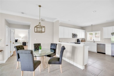 Fabulous Harmony Island and rarely available 3/3 with 2 covered on Oak Harbor Country Club in Florida - for sale on GolfHomes.com, golf home, golf lot