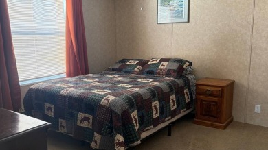 Welcome to this charming 2011 furnished 2-bedroom, 2-bathroom on Sabal Springs Golf and Racquet Club in Florida - for sale on GolfHomes.com, golf home, golf lot