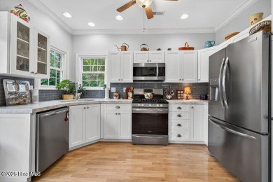 Elegance meets ease with coastal living on the golf course! This on North Shore Country Club in North Carolina - for sale on GolfHomes.com, golf home, golf lot