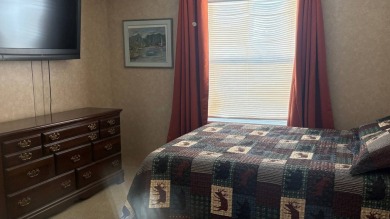 Welcome to this charming 2011 furnished 2-bedroom, 2-bathroom on Sabal Springs Golf and Racquet Club in Florida - for sale on GolfHomes.com, golf home, golf lot