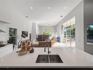 Welcome Home! This spectacular residence, boasting a lake and on Weston Hills Country Club in Florida - for sale on GolfHomes.com, golf home, golf lot