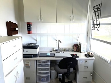 RENOVATED FRESH PAINT EXPANSIVE WATER VIEW WALK TO HOUSES OF on Hillsboro Pines Golf in Florida - for sale on GolfHomes.com, golf home, golf lot