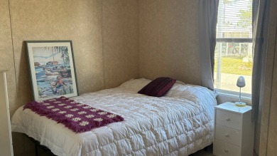 Welcome to this charming 2011 furnished 2-bedroom, 2-bathroom on Sabal Springs Golf and Racquet Club in Florida - for sale on GolfHomes.com, golf home, golf lot