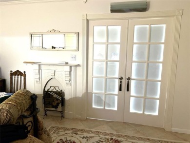 RENOVATED FRESH PAINT EXPANSIVE WATER VIEW WALK TO HOUSES OF on Hillsboro Pines Golf in Florida - for sale on GolfHomes.com, golf home, golf lot