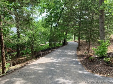 Discover your next chapter, nestled within the prestigious gated on The Club At Old Kinderhook in Missouri - for sale on GolfHomes.com, golf home, golf lot