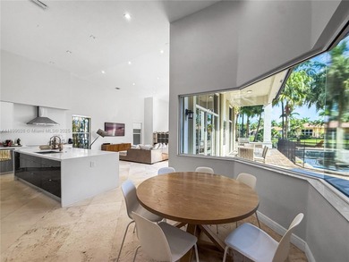 Welcome Home! This spectacular residence, boasting a lake and on Weston Hills Country Club in Florida - for sale on GolfHomes.com, golf home, golf lot