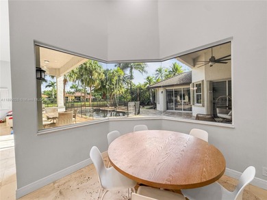 Welcome Home! This spectacular residence, boasting a lake and on Weston Hills Country Club in Florida - for sale on GolfHomes.com, golf home, golf lot