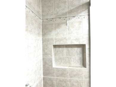 RENOVATED FRESH PAINT EXPANSIVE WATER VIEW WALK TO HOUSES OF on Hillsboro Pines Golf in Florida - for sale on GolfHomes.com, golf home, golf lot